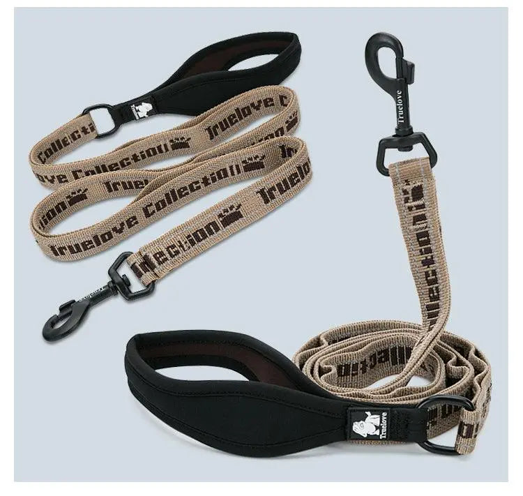 Durable reflective dog leash during a walk for enhanced safetyEdited Alt Text: Reflective dog leash providing safety during a walk.